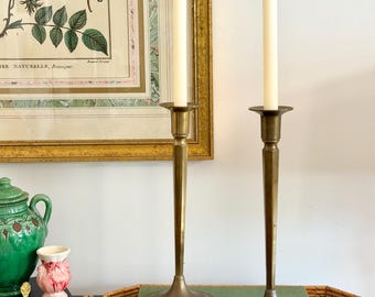 vintage pair of tall brass arts and crafts candlesticks