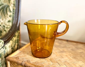 Jarra vintage de vidrio ámbar soplado a mano