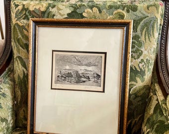 Grabado de rocas en el océano por Jack Barnett