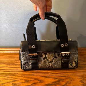 Multi top snake purse