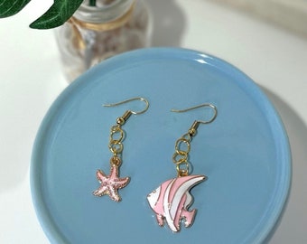 Sous les boucles d’oreilles de mer