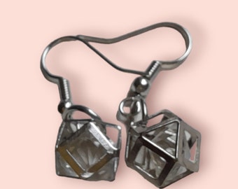 Boucles d'oreilles pendantes globe géométriques à découpes