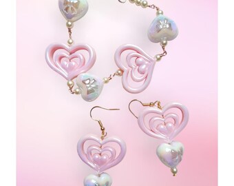 Ensemble bracelet en perles roses et boucles d'oreilles pendantes