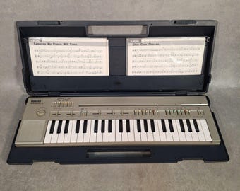 Vintage Yamaha Portasound PC-100 Portable Electronic Keyboard with case