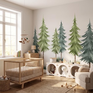 May include: A nursery room featuring a wall mural of watercolor pine trees in shades of green and blue. The room includes a light wood crib, a white storage unit with circular openings containing plush toys, and a beige armchair on a woven rug.