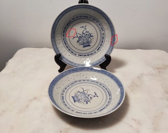 A set of two vintage Chinese  export blue and white rice grain soup bowls, plates, dishes, floral motif in the center,replacement,decorative