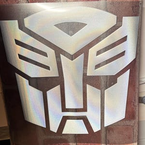 Autobot or Decepticon logo in iron on HTV