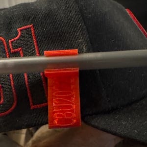 Ballpoint pen clip for baseball hat