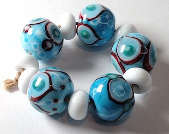 Turquoise rounds with stacked dot detail in red, white and teal - handmade glass beads - lampwork bead set - Jolene Beads