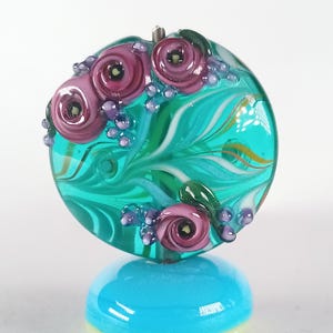 Teal green raked lampwork lentil focal bead with a purple tea roses - Jolene Beads