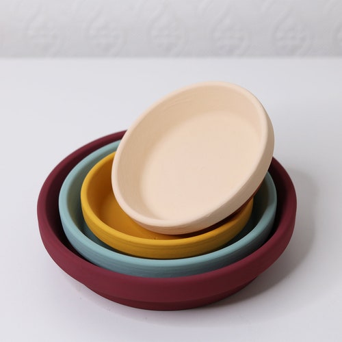 Customisable terracotta saucer for plant pots