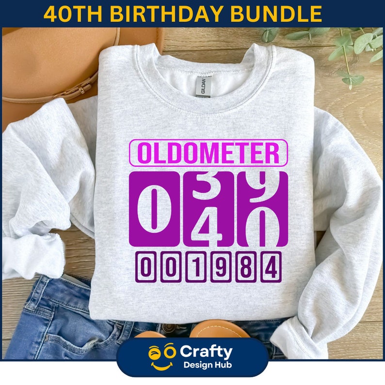 May include: A gray sweatshirt with a purple graphic that says "Oldometer" and displays the numbers "0340" and "001984".