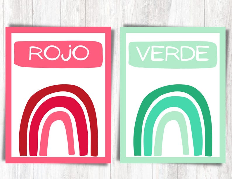 May include: Two printable cards with rainbow designs. The card on the left is pink with a red rainbow and the word "ROJO" in white. The card on the right is green with a green rainbow and the word "VERDE" in white.