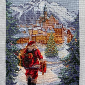 Le Père Noël apporte des cadeaux