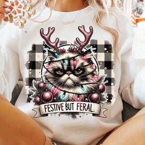 Festive but Feral Christmas Cat PNG Funny Grumpy cat Holiday Clipart Sarcastic Xmas Cat shirt ornament mug Design