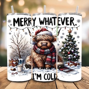 May include: A white tumbler with a straw features a Highland cow wearing a Santa hat and a red plaid scarf. The text "MERRY WHATEVER. I'M COLD" is displayed. The tumbler is decorated with a Christmas tree, snowflakes, and presents.