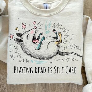 Playing Dead Is Self Care PNG, Funny Possum Shirt Design, Chaotic Animal Meme, Burnout Humor Graphic, Goblincore Feral Creature