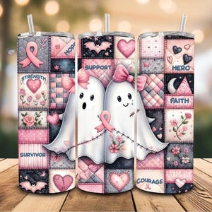 May include: Three stainless steel tumblers with straws, featuring a patchwork design in pink, gray, and black. The design includes ghosts, hearts, ribbons, and words like "Strength", "Support", and "Faith".