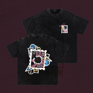 May include: Black t-shirts with a vintage-style graphic on the front and back. The graphic resembles a postage stamp with floral and geometric designs, and the number "17c". The shirts are from the "K Bloom" brand.