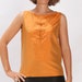 see more listings in the Tops & Tunics section