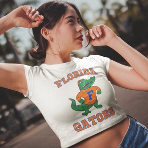UF Crop Top Baby Tee | University of Florida, UF Gator Sweatshirt, Uf Merch Vintage, Uf Gator Shirt, Uf Graduation, Football, Florida Gators