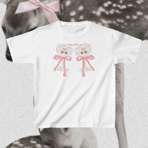 In My Coquette Era Baby Tee | Coquette Clothing, Soft Girl Aesthetic, Coquette Shirt, Coquette Baby Tee, Dollette Coquette, Y2K Baby Tee