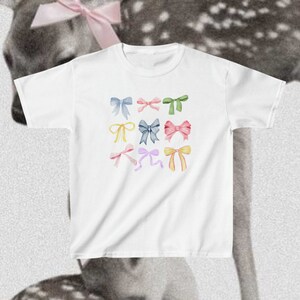 Pastel Ribbons Baby Tee | Coquette Clothing, Soft Girl Aesthetic, Coquette Shirt, Coquette Baby Tee, Dollette Coquette, Y2K Baby Tee