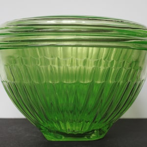 Sold at Auction: Lot of Three Vaseline Glass Nesting Bowls