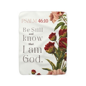 May include: A white background with a floral design featuring red and pink flowers. The text "PSALM 46:10" is at the top of the image. The text "Be Still and know that I am God." is in the center of the image.