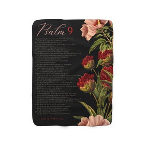 May include: Black and white floral patterned throw blanket with the text "Psalm 9" and the words "God is with you" in red. The text includes verses from Psalm 9 of the Bible.