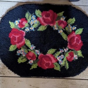 Antique oval rose and flower rug hooking piece