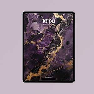 May include: A purple and gold marble design on an iPad screen with the time 10:00 displayed. The date is Tuesday, 22 January.