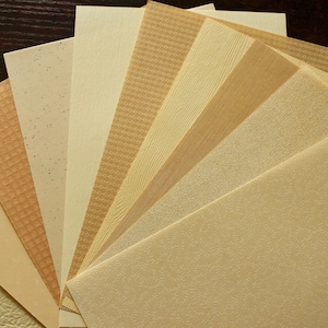 Kleurrijk ephemera-papierpakket: crème thema, plakboekpapier met textuur melkthee, decoratief papier, collagepapier, ambachtelijke papierkunst, gemengde kunst