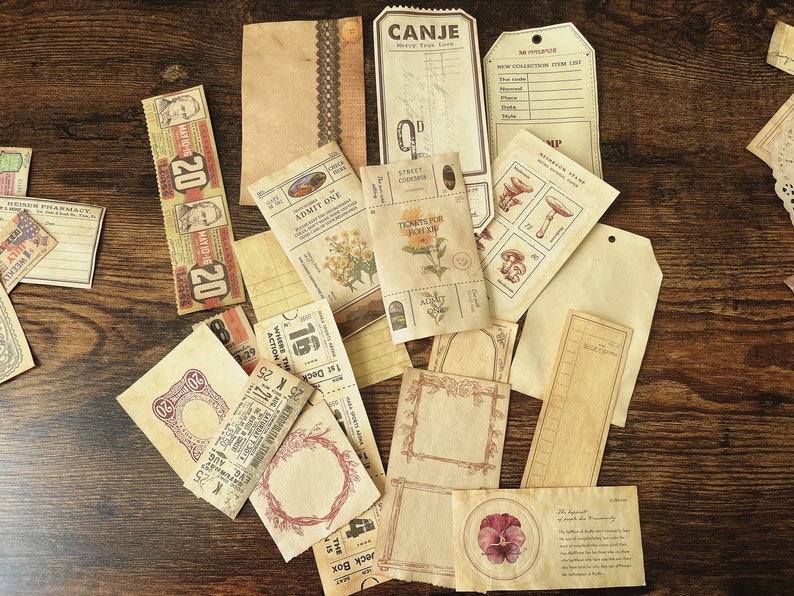 May include: A collection of vintage-style paper ephemera, including tickets, tags, and labels. The paper is cream-colored with brown and black ink. The text on the paper includes "CANJE", "ADMIT ONE", "TICKETS FOR HEAVEN", "STREET ADDRESS", "NO COLLECTION ITEM LIST", and "20".