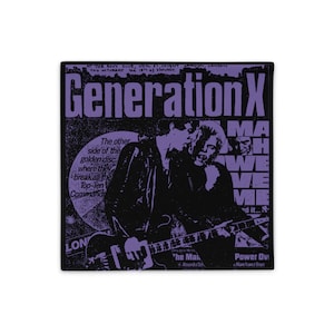 May include: A purple and black poster with the text "Generation X" and a band playing a guitar. The poster advertises a concert at the Roxy Club in London on 18th January.