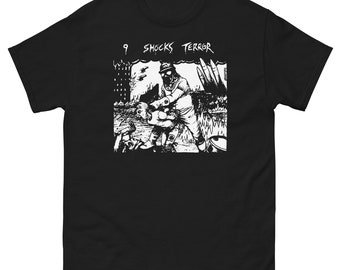 May include: Black t-shirt with a white graphic print of a person in a gas mask holding a child. The text "9 Shocks Terror" is printed above the graphic.