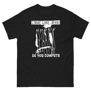 May include: Black t-shirt with white text and graphic. The text reads "Drive Like Jehu" and "Do You Compute". The graphic is a stylized drawing of five figures.