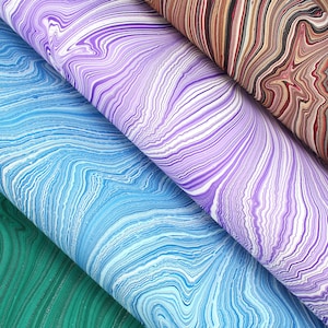 A2 hand marbled paper | Designs in bright colours | some seconds all suitable for book binding, box making and paper crafts