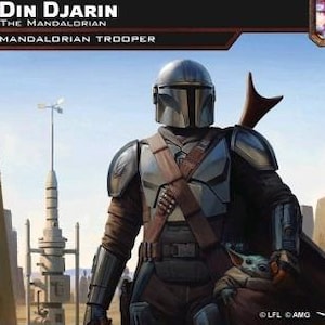 May include: A collectible game card featuring Din Djarin, the Mandalorian, wearing a metallic silver helmet and armour with a brown strap. A small green creature is held in a brown pouch. The card displays the text Din Djarin, The Mandalorian, 95.