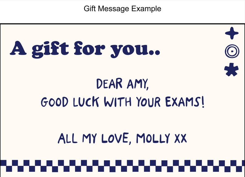 May include: A white card with blue text and symbols. The text reads "A gift for you... Dear Amy, Good luck with your exams! All my love, Molly xx".