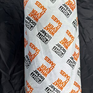 May include: White paper wrapping with a repeating pattern of the words "Fight", "Locker", "What", and "It Ever Takes".