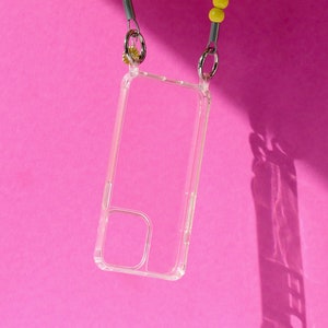 Étui de téléphone portable transparent avec anneaux/œillets pour chaînes de téléphone portable, en option avec mousqueton pour la fixation, pour tous les modèles d'iPhone