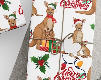 May include: White wrapping paper with a repeating pattern of cartoon kangaroos wearing Santa hats and scarves, with the words "Merry Christmas" in red script. The gifts are tied with twine and star-shaped tags. A ball of twine and scissors are also visible.