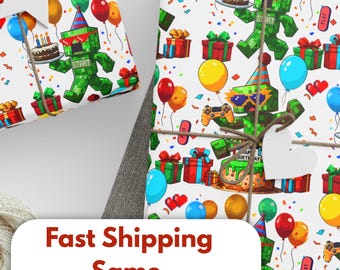 May include: Two sheets of wrapping paper with a white background and a repeating pattern of green pixelated characters holding birthday cakes, balloons, and video game controllers. The text "Happy Birthday" and "Start" are on the wrapping paper.