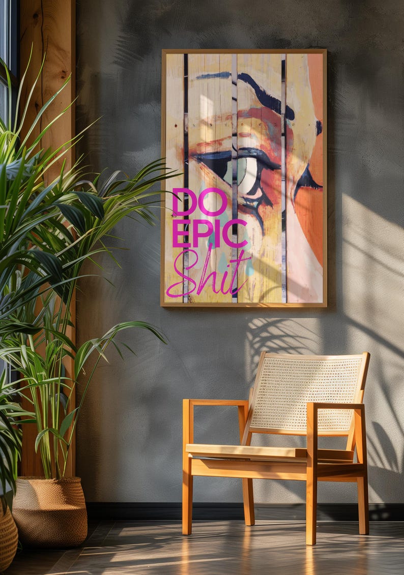 May include: A framed print with a colorful abstract painting of an eye and the text "DO EPIC SHIT" in pink letters.