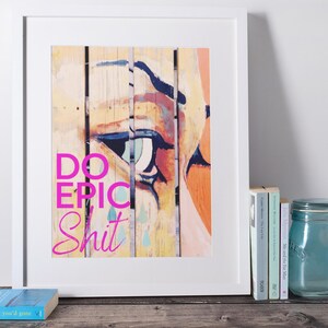 May include: A colorful abstract art print with a close-up of a painted eye and the text "DO EPIC SHIT" in pink.
