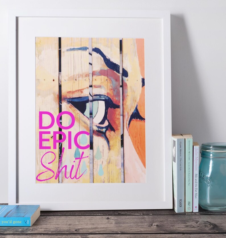 May include: A colorful abstract art print with a close-up of a painted eye and the text "DO EPIC SHIT" in pink.