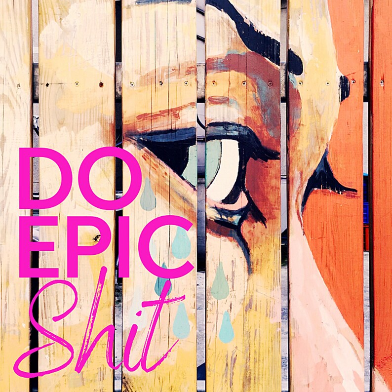 May include: A colorful wooden fence with a painted eye and the words "DO EPIC SHIT" in pink letters.