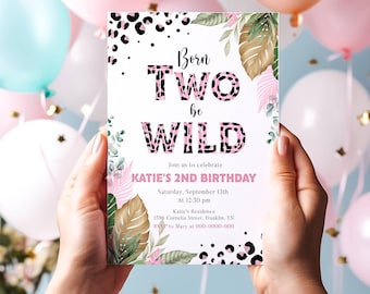 May include: A birthday invitation with the text "Born Two be Wild" in pink leopard print. The invitation includes details for Katie's 2nd birthday, with floral and leaf accents. The background features balloons in pink and blue.