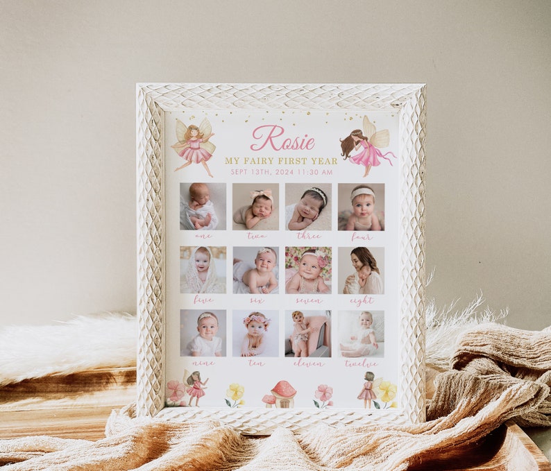 May include: A white textured frame containing a personalized baby milestone board titled Rosie My Fairy First Year. The board features twelve individual photographs of an infant, labeled one through twelve, decorated with fairy and mushroom illustrations.